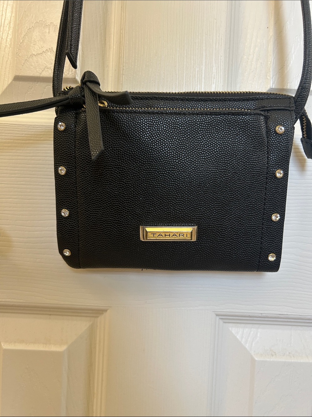 Tahari Black Pebbled Crossbody with Gold Plaque and Stud Accents